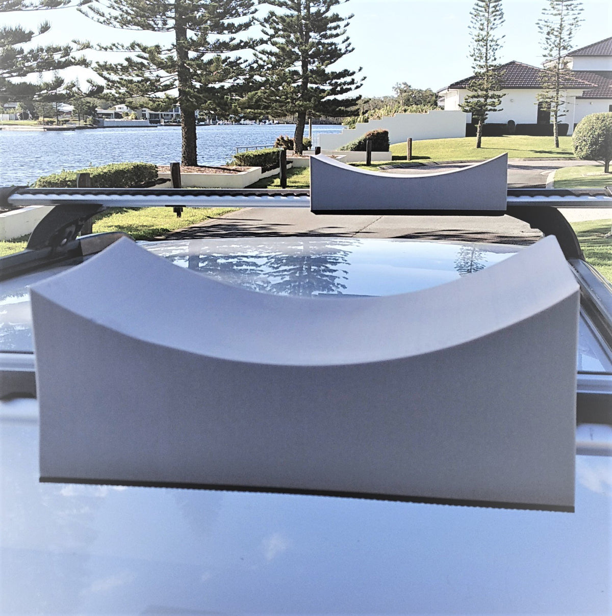 foam car roof rack mounts shown on vehicle