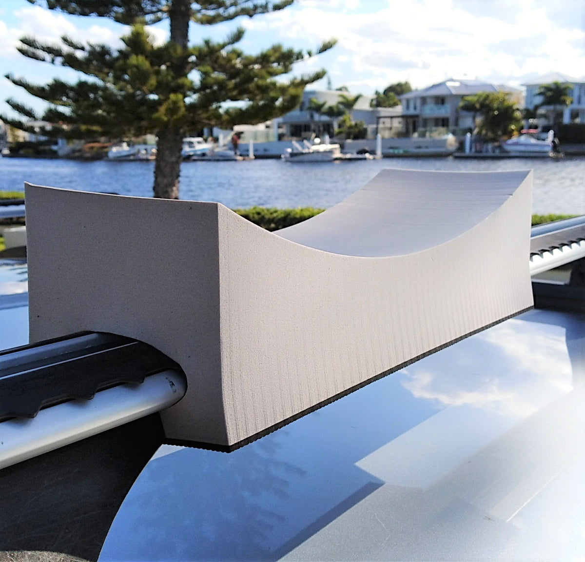 Foam roof rack kayak mount on vehicle