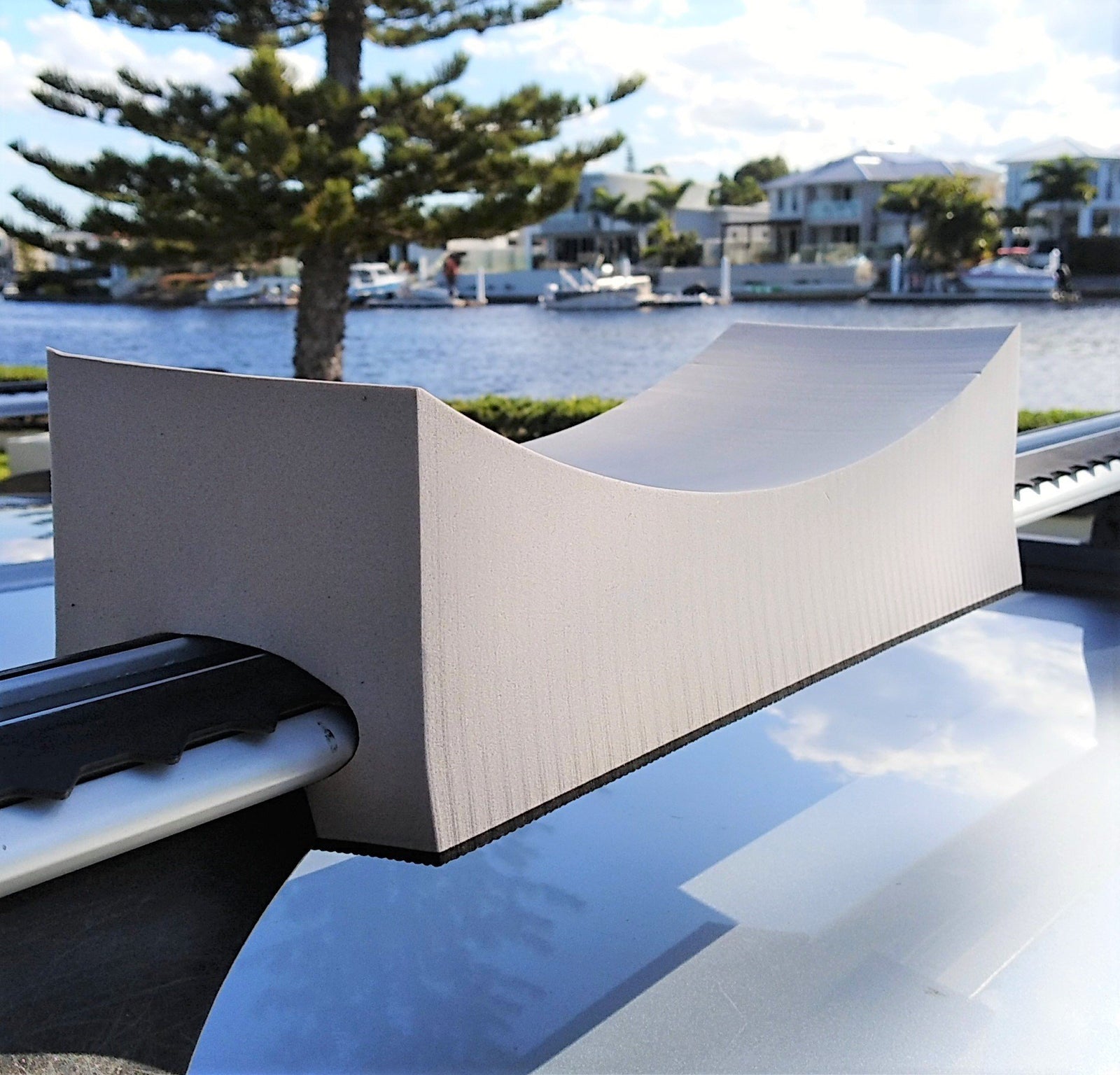 Foam roof rack kayak mount on vehicle